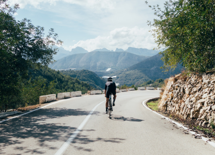 Cyclists on a route on the mountain road