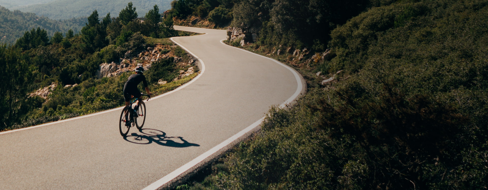 Cyclist cycling on a mountain road