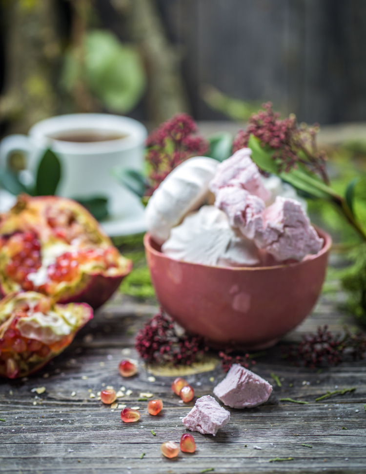 Bowl with sweets and coffee in the background