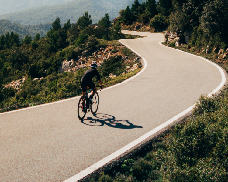 Cyclist on a mountain road